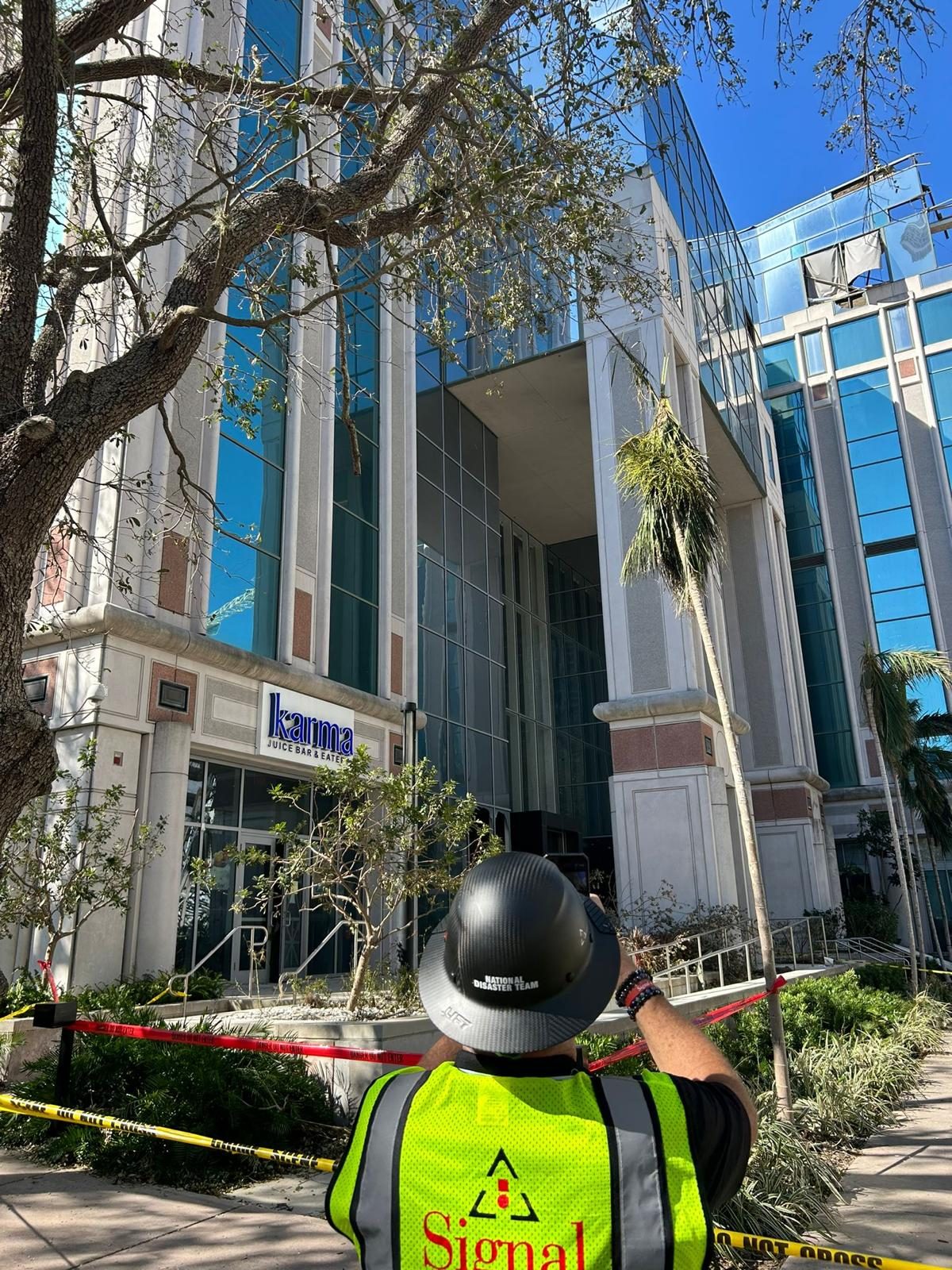 BlueSky specialist inspecting a commercial building exterior