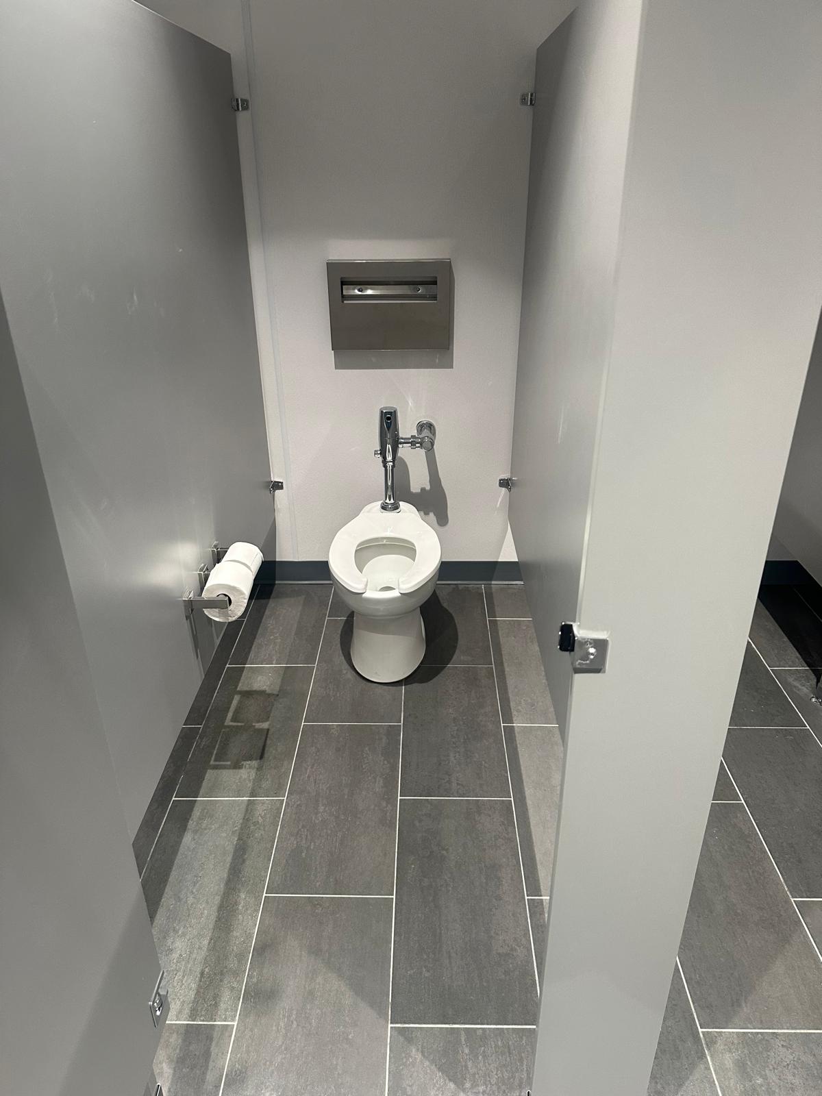 Clean commercial restroom stall maintained by BlueSky janitorial service