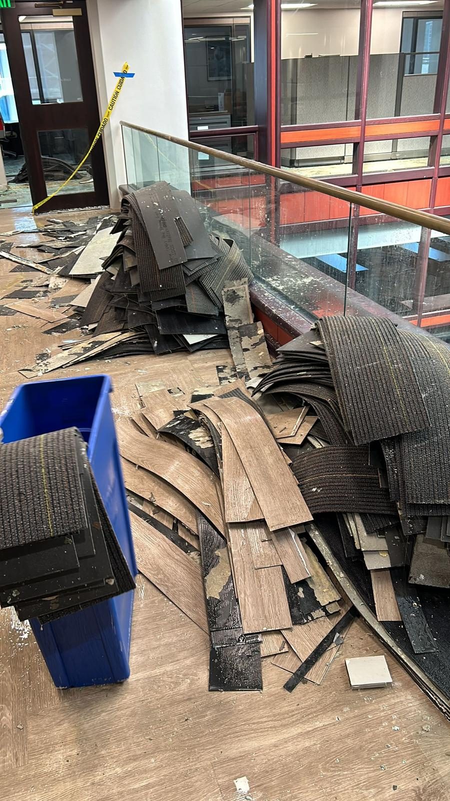 Debris and removed flooring staged during Milton recovery