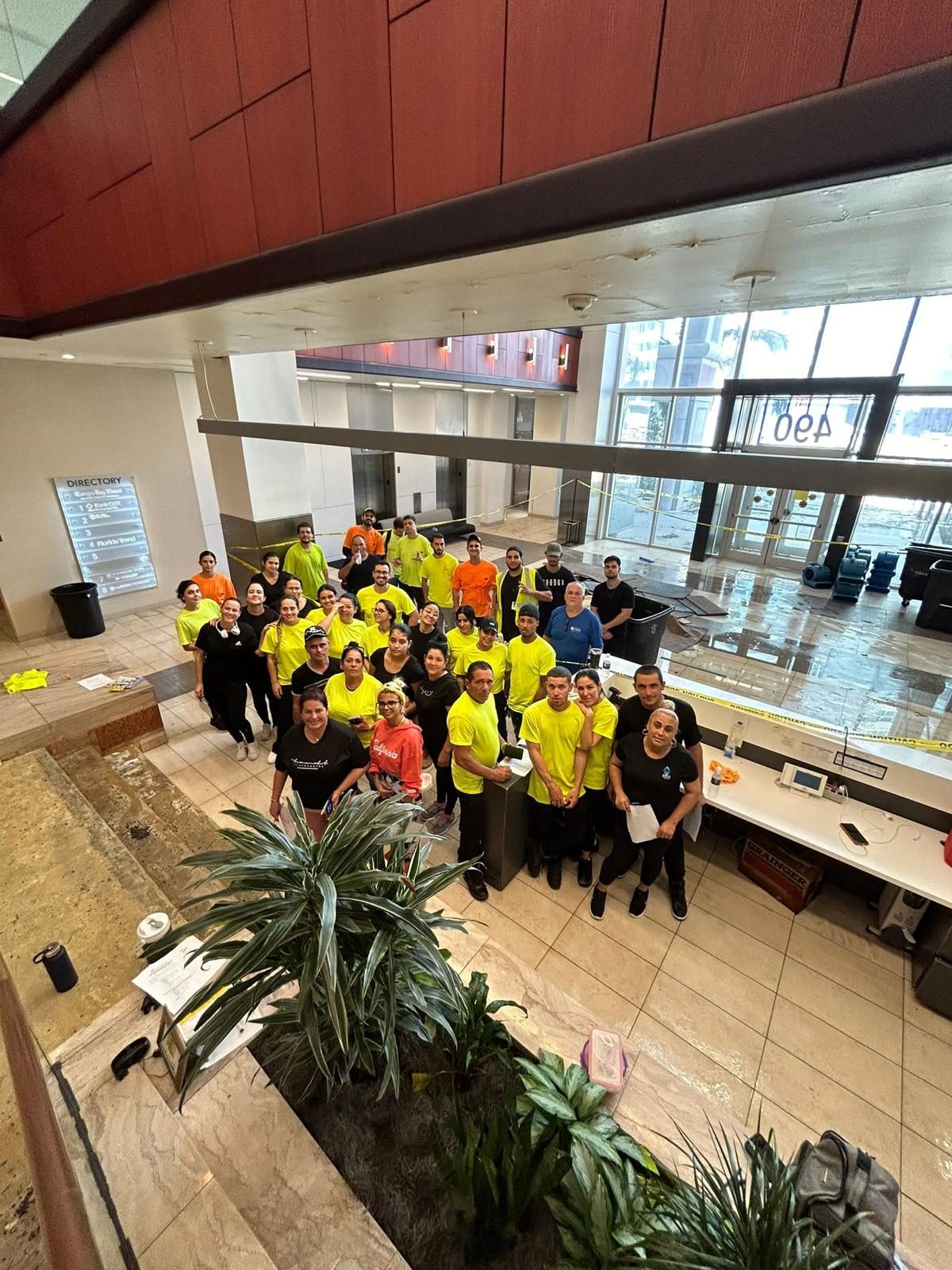 The full BlueSky field team assembled together in a commercial lobby