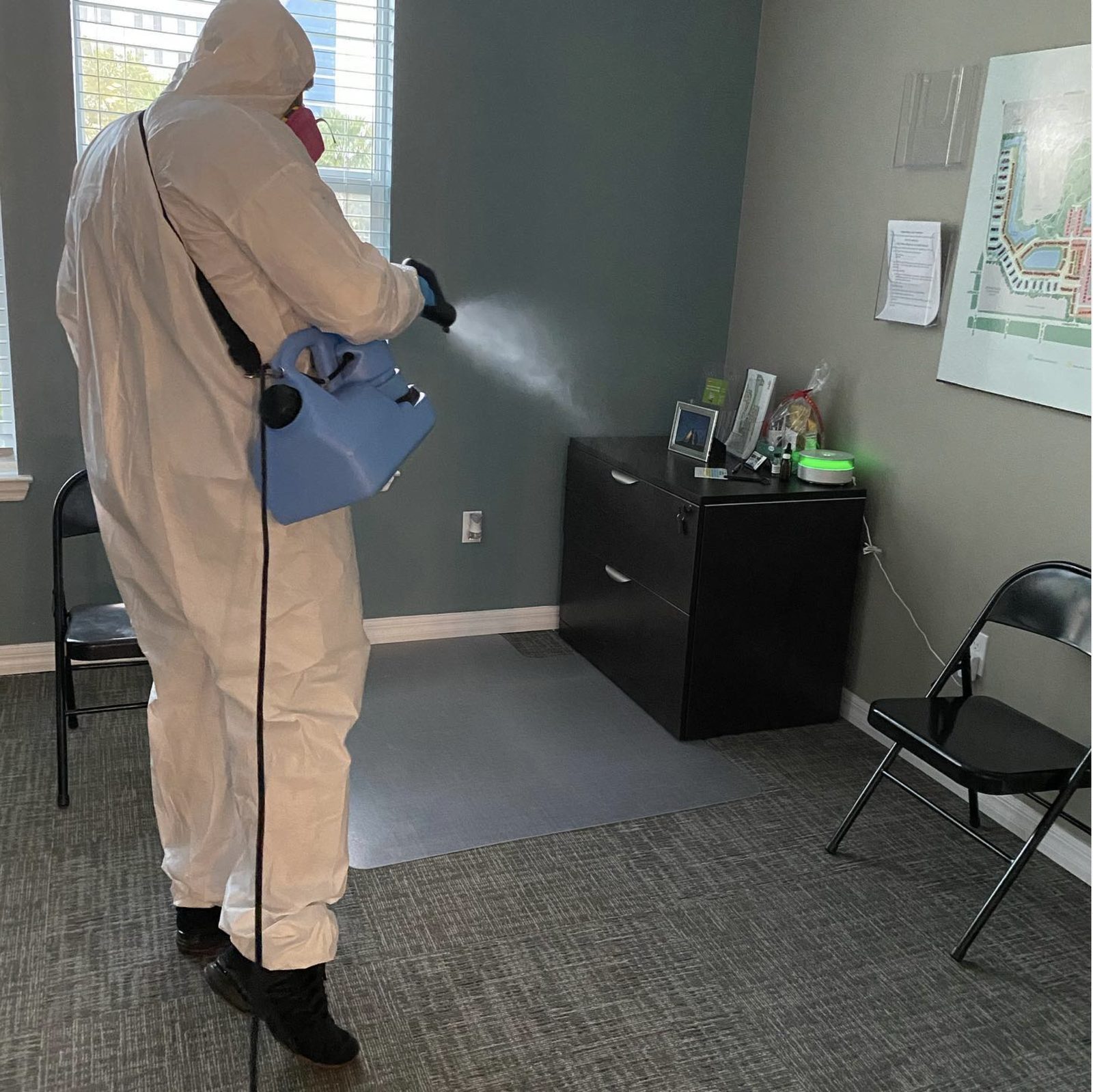 BlueSky technician applying electrostatic fog disinfection