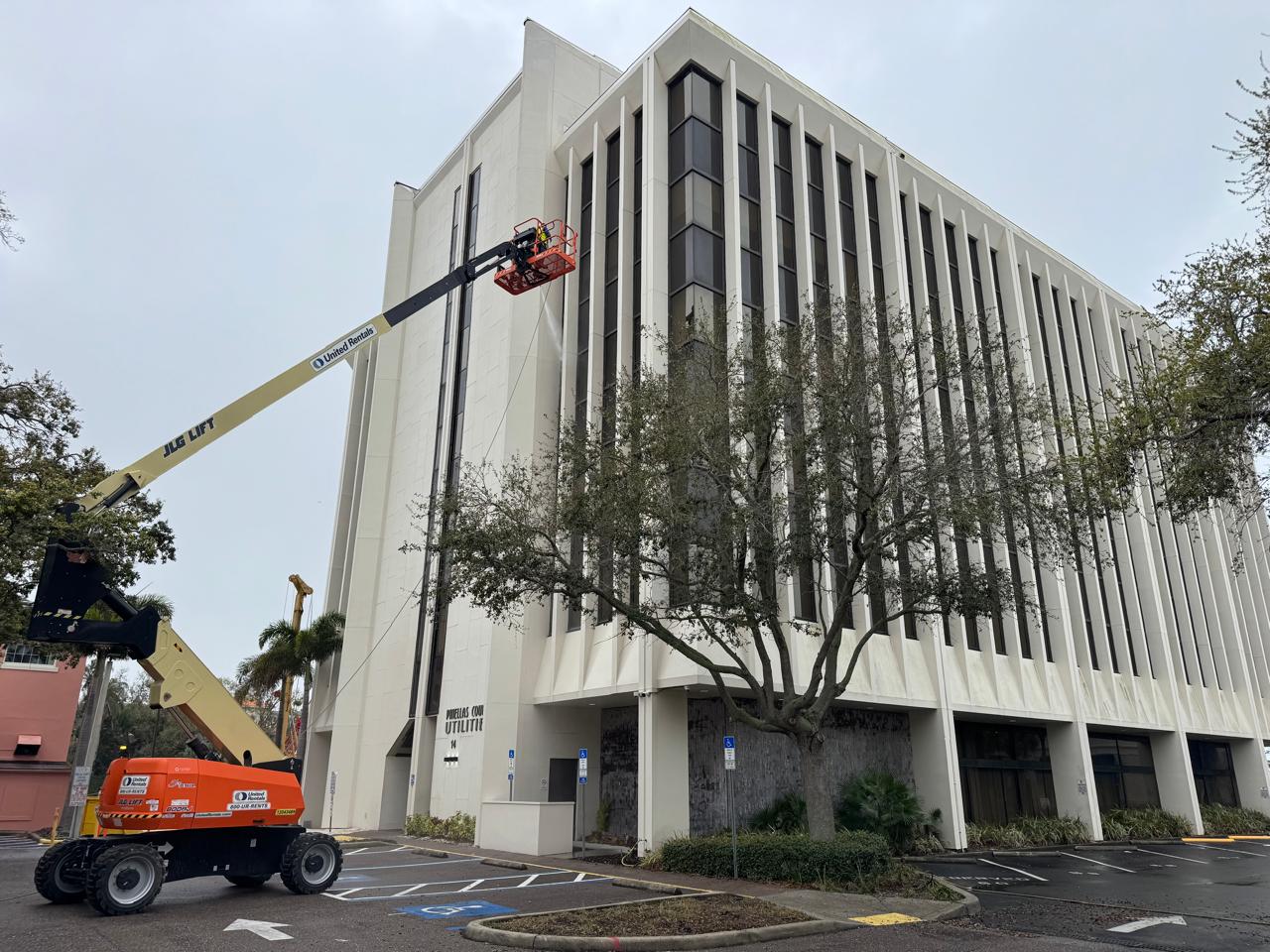 Commercial window cleaning work completed from a boom lift